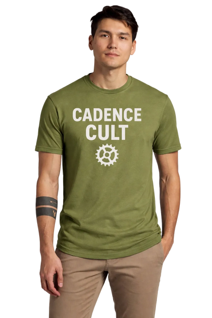 Person wearing a green t-shirt with 'Cadence Cult' text and logo on a plain background
