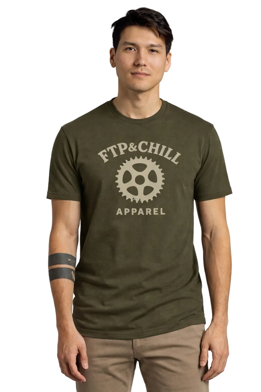Man wearing a green t-shirt with 'FTP&CHILL APPAREL' logo on a plain background
