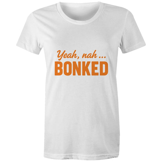 Female cyclist wearing Women’s Yeah Nah, Bonked white tee at café stop