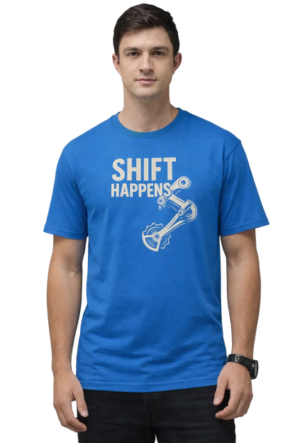 Person wearing a blue t-shirt with 'SHIFT HAPPENS' text and graphic on a gray background
