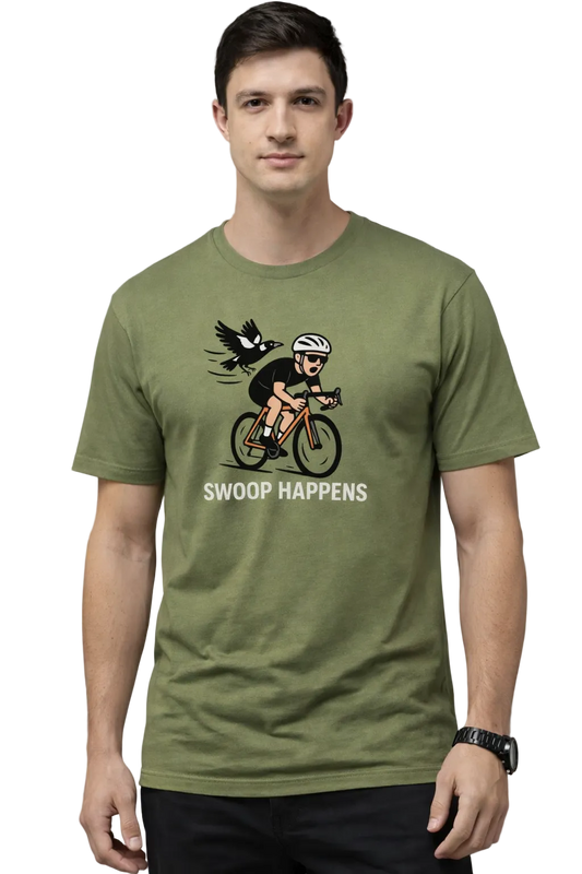 Man wearing a green t-shirt with a graphic design of a magpie swooping a cyclist and text "SWOOP HAPPENS"