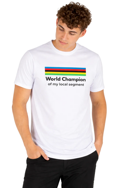 Person wearing a white t-shirt with colorful stripes and text on a plain background