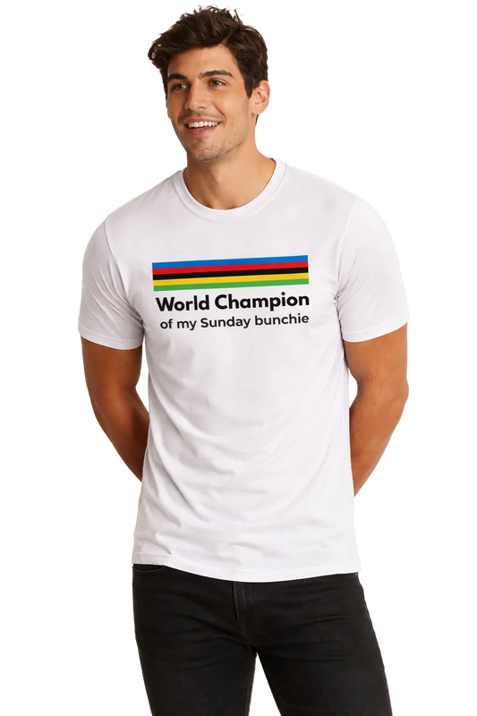Man wearing a white t-shirt with colorful text design on a plain background