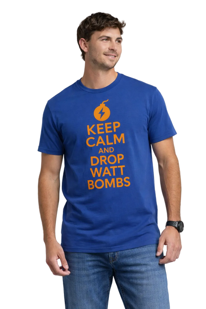 Man wearing a blue t-shirt with orange text reading keep calm and drop watt bombs on a gray background