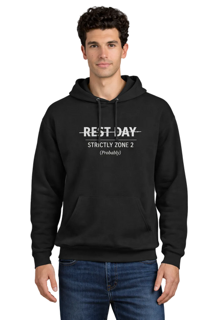 Man wearing a black hoodie with text "Rest Day" crossed out then "strictly zone  on a white background (probably)