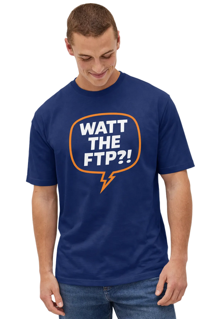 Man wearing a blue t-shirt with a humorous graphic and text on a plain background