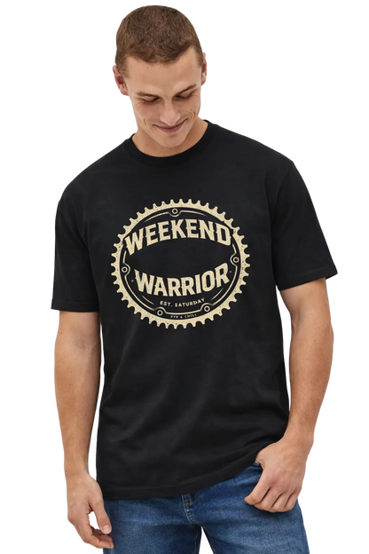 Man wearing a black t-shirt with 'Weekend Warrior' print on a plain background